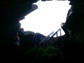 Under a lava tube along the side of the road east of Keflavik.