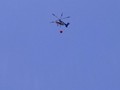 This helicopter was putting out a forest fire nearby. The smell of the smoke was everywhere.