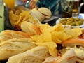 Time for some montaditos, olives, beer, and juice.