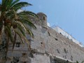 The walls of old Peniscola on a peninsula, surrounded by two beautiful Mediterranean beaches.