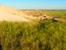 The expanse of prairies and badlands stretch as far as the eye can see.