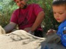 Building a sand castle out of high desert sand.