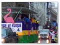 The crowd calls for beads during the Spanish Town parade on Lafayette Avenue.