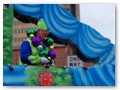 A participant in the Poseidon parade enjoying life on the float.