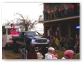 Very soggy and lively floats go by in the Spanish Town parade.