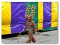 Carnival beast. He danced around, cracking this whip.