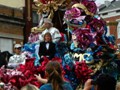 The Mid-City parade is a formal, old-fashioned affair. Here is the king.