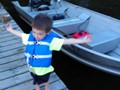 Andrew reporting on the size of the fish he caught on Plum Lake.