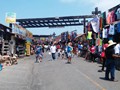The gauntlet of desperate vendors and fish restaurants on the walkway to Bufadora. 