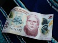Echanged money. All countries have more interesting money than ours.
